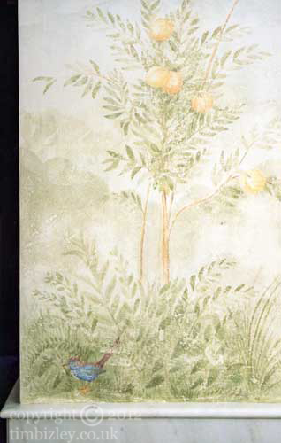 mural of tree with peaches and a song bird