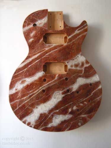 red marble effect painted simulation of Rouge Royal on guitar body