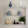 shelves made to look old and worn in blue and cream
