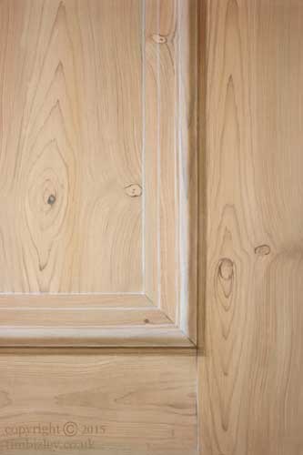detail veiw of antique Georgian pine wood graining and trompe l'oeil panel